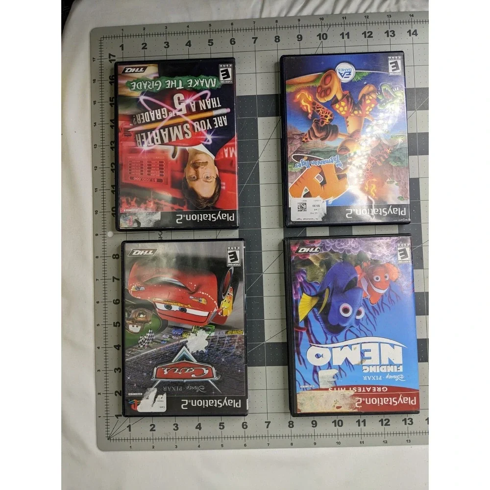 Playstation 2 Game Lot 5th Grader Tasmanian Cars Nemo‎